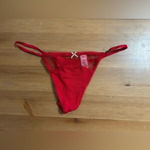 Victoria’s Secret Stretch Cotton Dot Mesh V-String
Panty in lipstick red
